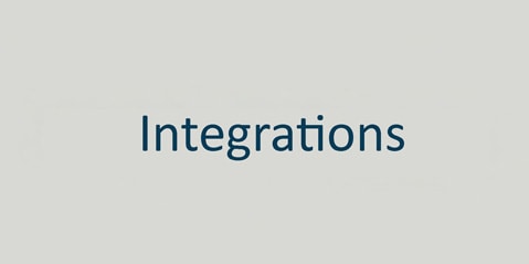 Text „Integrationen“ in blauer Schrift zentriert auf einem einfachen, hellgrauen Hintergrund.