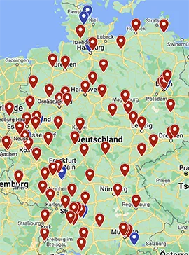 Karte von Deutschland mit roten und blauen Ortsmarkierungen, die über verschiedene Städte und Regionen verteilt sind.