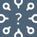 Icon-Impulsfragen: Ein Bild zeigt ein zentrales weißes Fragezeichen auf einem grauen Hintergrund, umgeben von acht Lupen, die in verschiedene Richtungen zeigen.